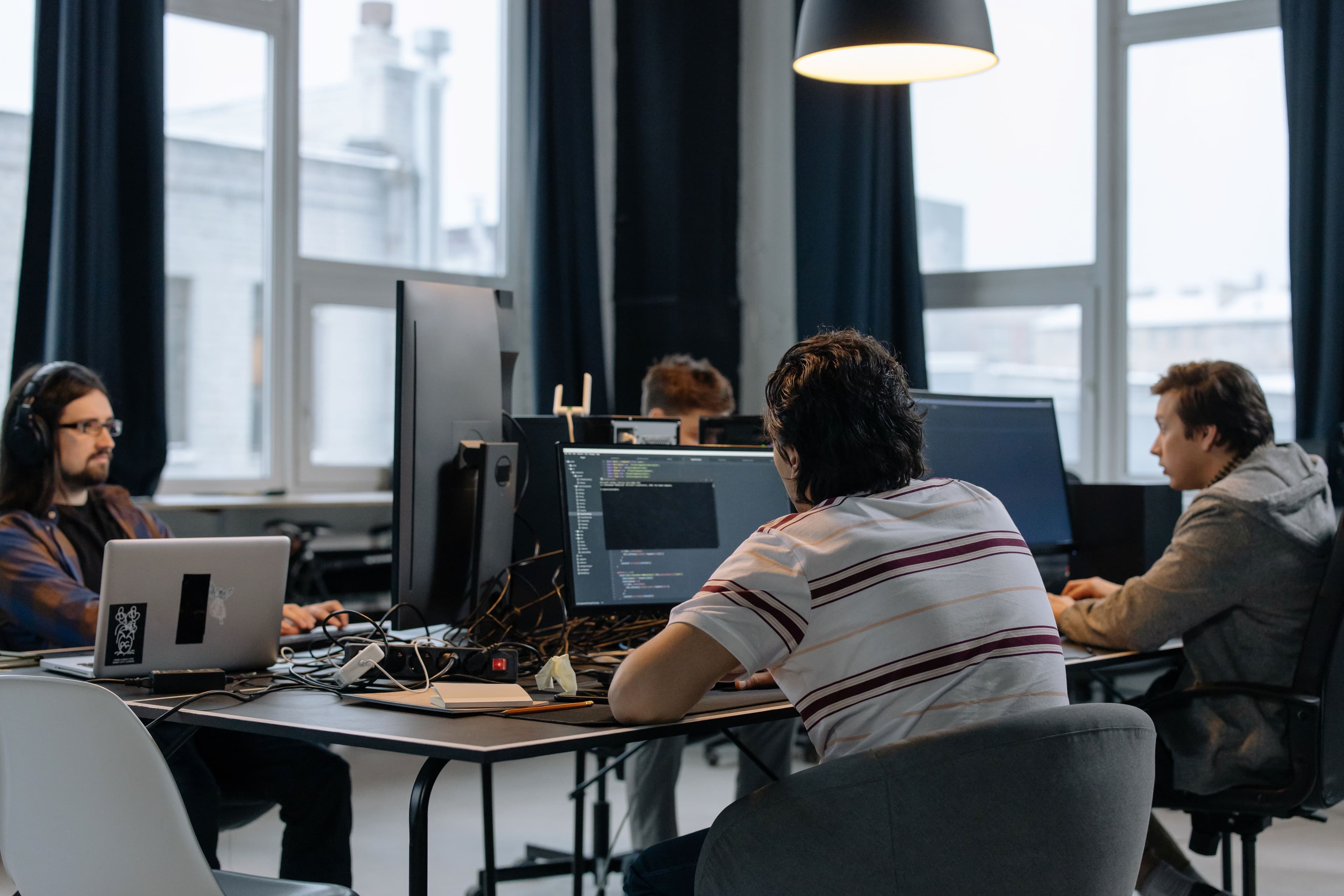 Developers working together at their desks