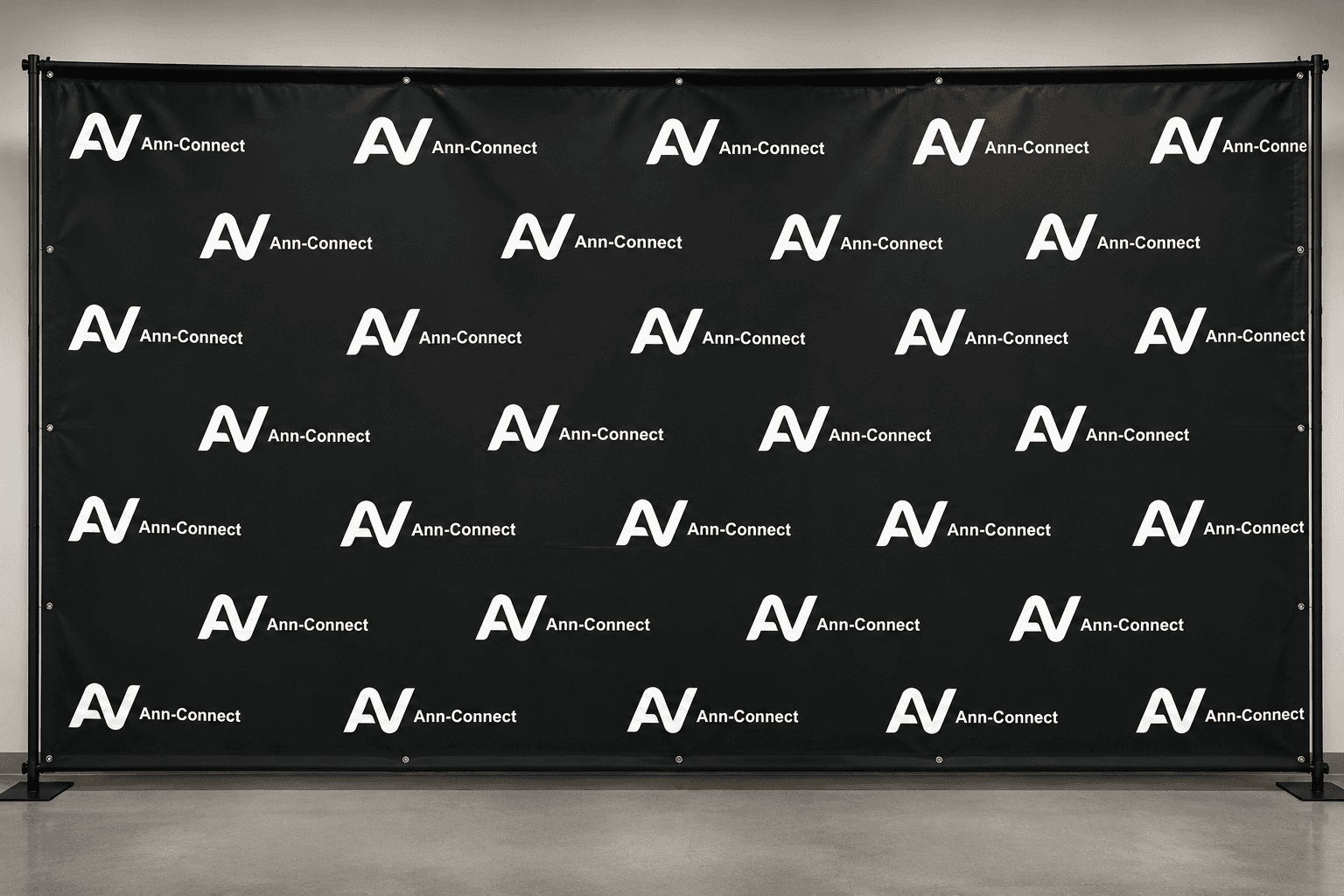 An Ann-Connect branded step-and-repeat exhibition banner