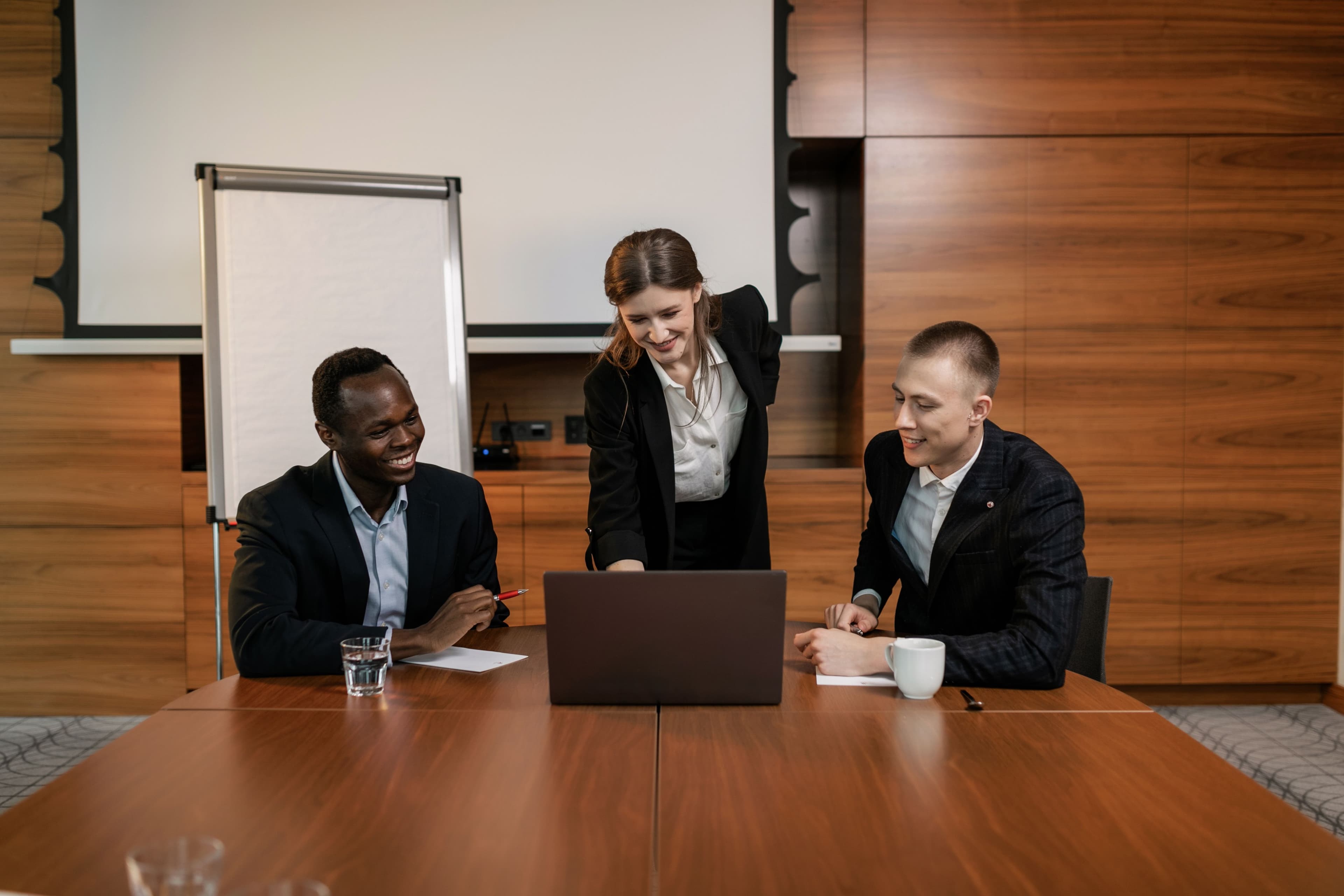 A team meeting in a modern office boardroom